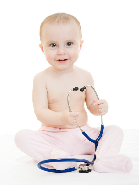 Happy baby with stethoscope on white background. - Foto, imagen