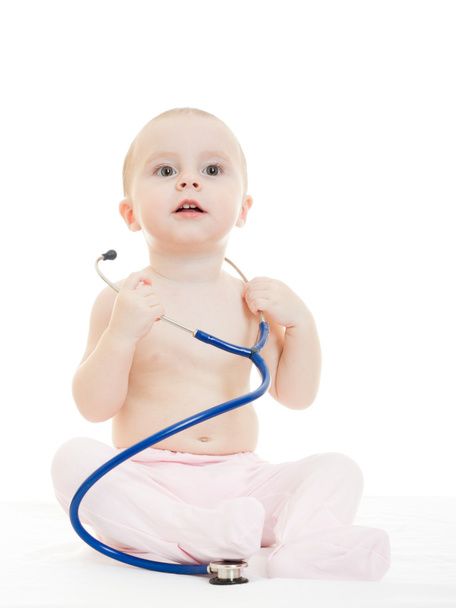 Happy baby with stethoscope on white background. - 写真・画像