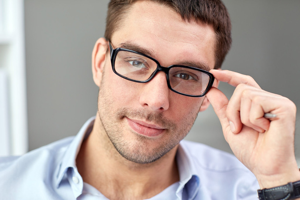 portrait of businessman in eyeglasses at office - Foto, Imagem