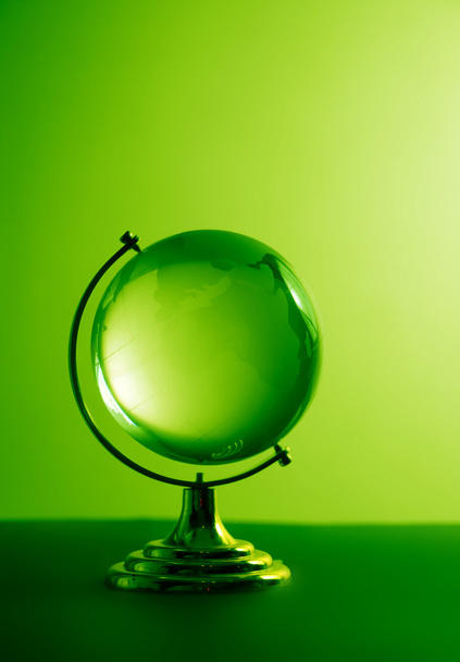Green glass globe - 写真・画像