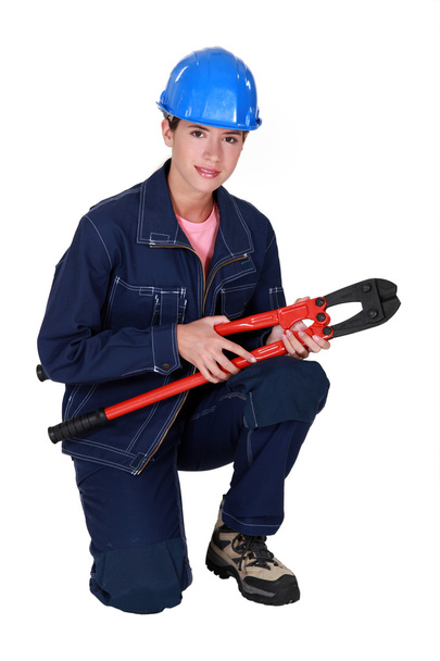 Tradeswoman holding large clippers - Foto, Imagen