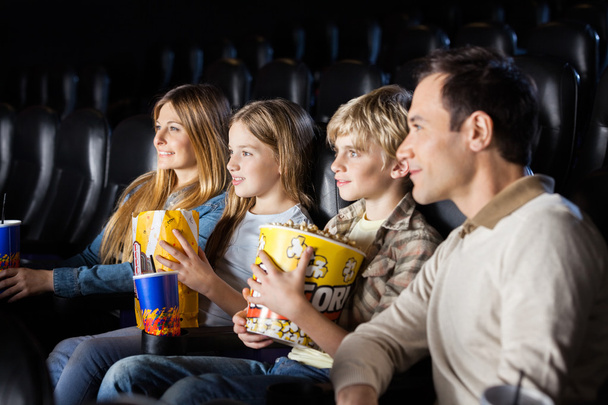 Family Watching Film In Theater - Фото, изображение