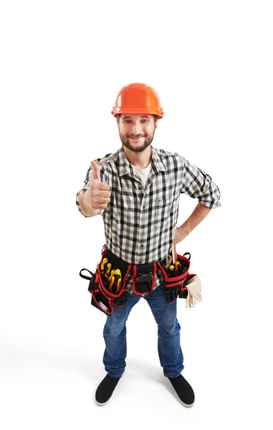 smiley builder in hard hat and belt - Foto, Imagem