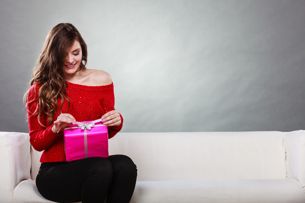 girl opening present pink gift box - Foto, Imagen