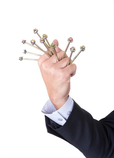 fist and screws on hand of businessman - Фото, изображение