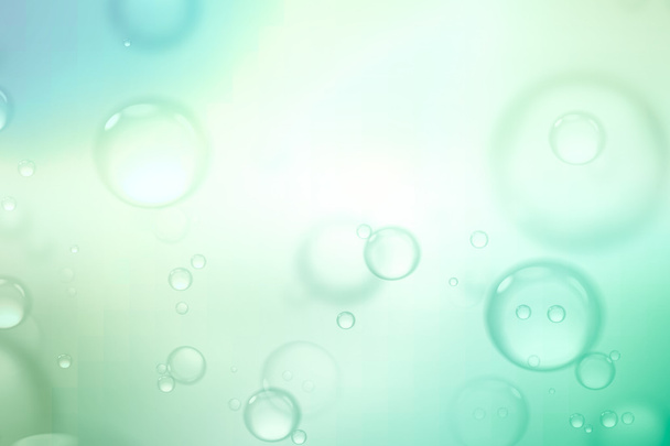 Burbujas de jabón sobre fondo verde, fondo abstracto
. - Foto, Imagen