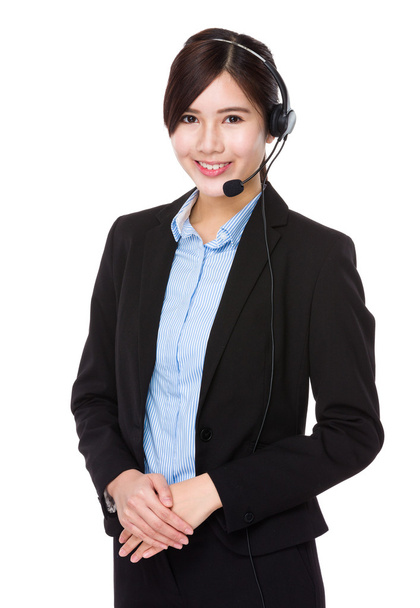 Operador de servicio al cliente con auriculares
 - Foto, imagen
