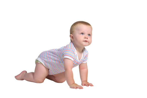 Bébé rampe à quatre pattes et lève les yeux
 - Photo, image