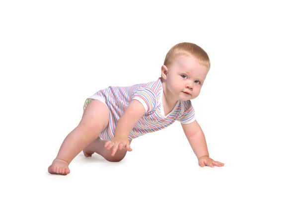 Baby crawls on all fours and look - Zdjęcie, obraz