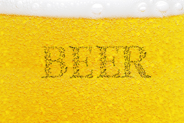 Beer with bubbles close up - Foto, Imagem