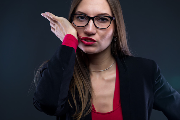Image of woman smudging lipstick - Photo, Image