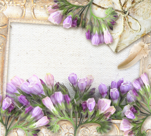 Flower greeting card. Symphytum officinale. Wedding card or invitation in grunge or retro style. Congratulations card with flowers, pearl necklace, package and place for your text. - 写真・画像