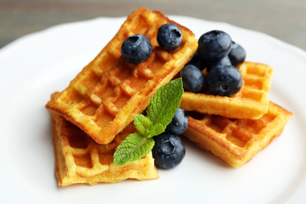 waffles with berries and chocolate sauce - 写真・画像