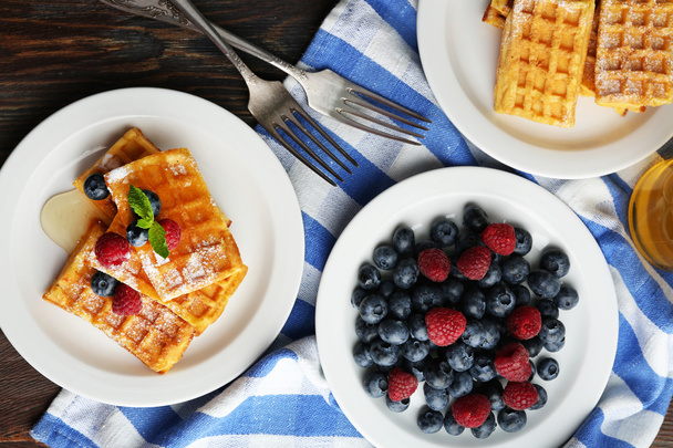 Sweet homemade waffles with forest berries - Fotó, kép