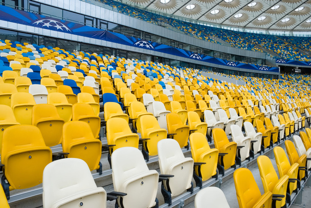 KIEV (KYIV), UKRAINE - October 04, 2012: Empty chairs before a football match - Photo, Image