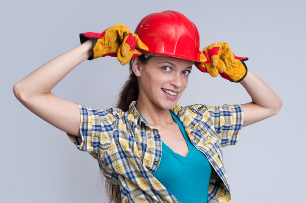 young woman construction worker - Foto, afbeelding