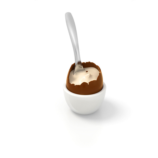 Великоднє шоколадне яйце з ванільною начинкою та чайною ложкою
  - Фото, зображення