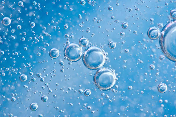 Macro Oxygen bubbles in blue clear water - Photo, Image