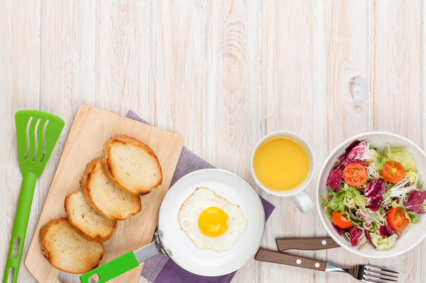 Healthy breakfast with fried egg - Photo, Image
