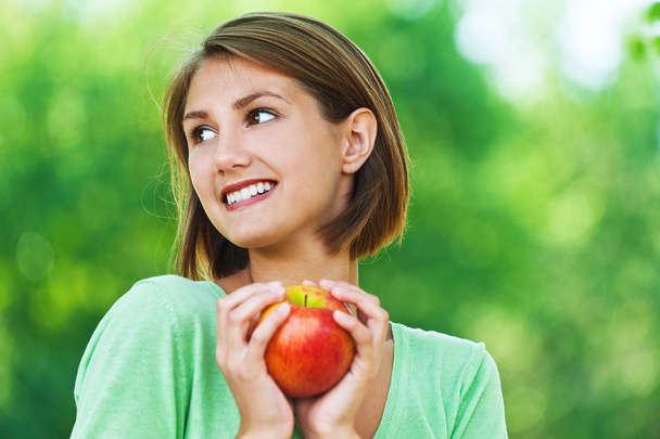 Women - vegetarian with apple - Photo, image