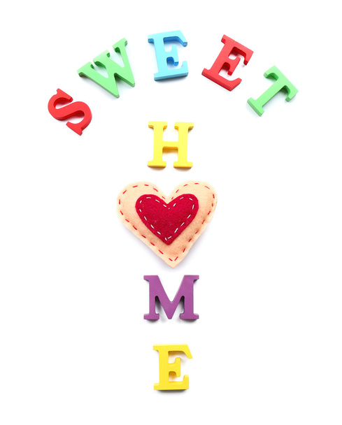 Decorative letters forming words SWEET HOME with heart isolated on white - Valokuva, kuva