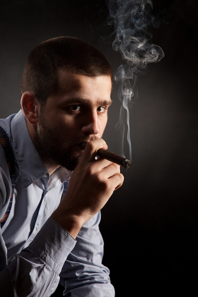 Guy in a business style with a cigar - Photo, Image