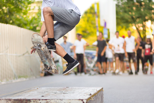 Boys skateboarding on street. Urban life. - Photo, Image