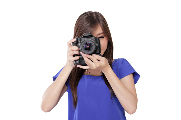 Photographer girl focusing at you - Foto, Imagen