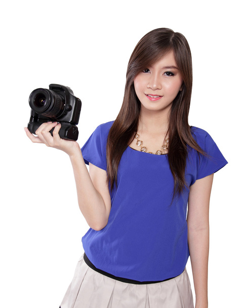 Aasian tyttö tuo kameran
 - Valokuva, kuva