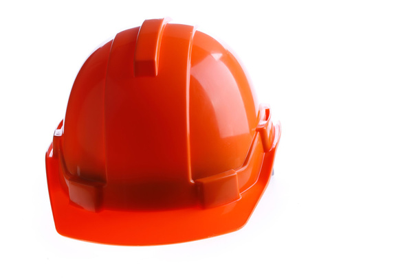 Oranje veiligheid helm harde hoed, hulpprogramma beschermen werknemer van gevaar - Foto, afbeelding