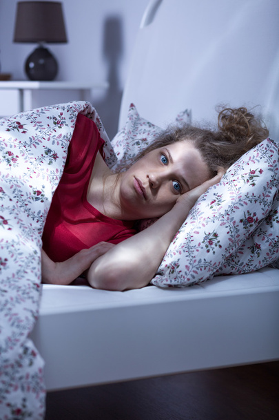 Woman suffering from insomnia - Foto, afbeelding
