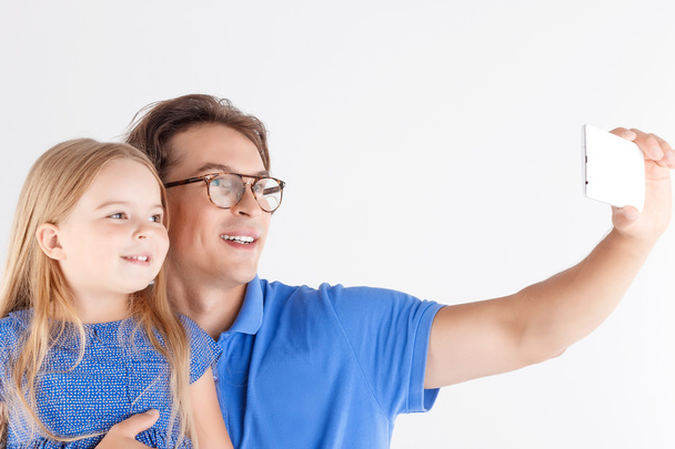 Father and daughter making photos  - Photo, image
