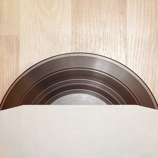 Disque vinyle avec couvercle
 - Photo, image