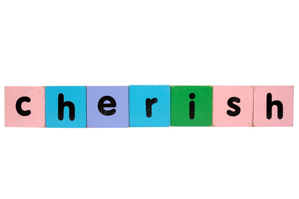 Cherish in giocattolo giocare lettere in blocco con percorso di ritaglio su bianco
 - Foto, immagini