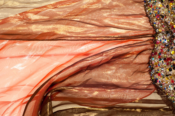 Рожево-коричнева прозора тканина. текстура. халат. Фотографії в студії
 - Фото, зображення