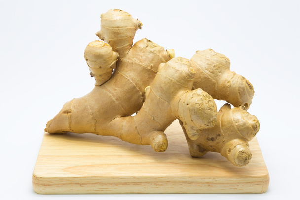 Fresh root ginger on wooden board - Photo, Image