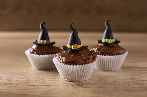 Three cupkaces with witch hat halloween holiday - Фото, зображення