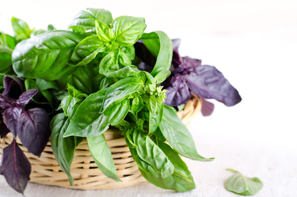 Herb leaf selection in a rustic wooden basket - Photo, Image