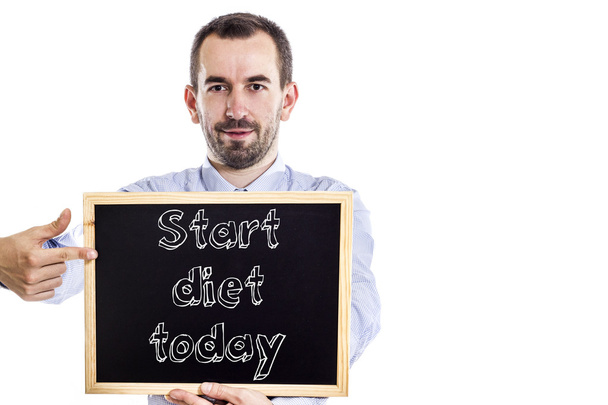 Start dieet vandaag - jonge zakenman met blackboard - Foto, afbeelding