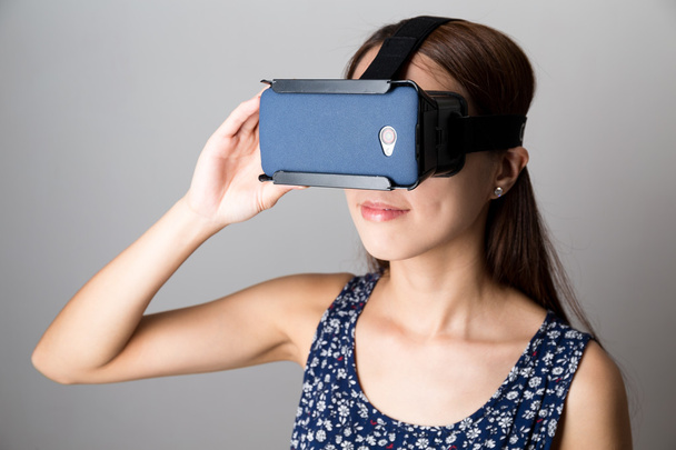 Woman using the virtual reality device - Photo, Image