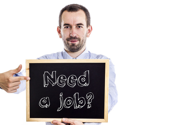 Αρκεί μια εργασία; -Νέος επιχειρηματίας με μαυροπίνακα - απομονωθεί σε λευκό - Φωτογραφία, εικόνα