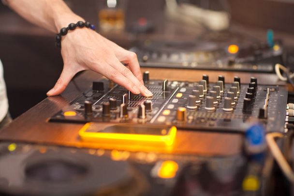 DJ mixing music on console - Foto, immagini