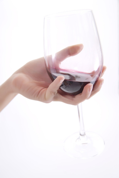 Glass of wine in hand - Photo, Image