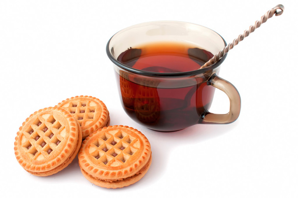 hrnek černého čaje a sušenky - Fotografie, Obrázek