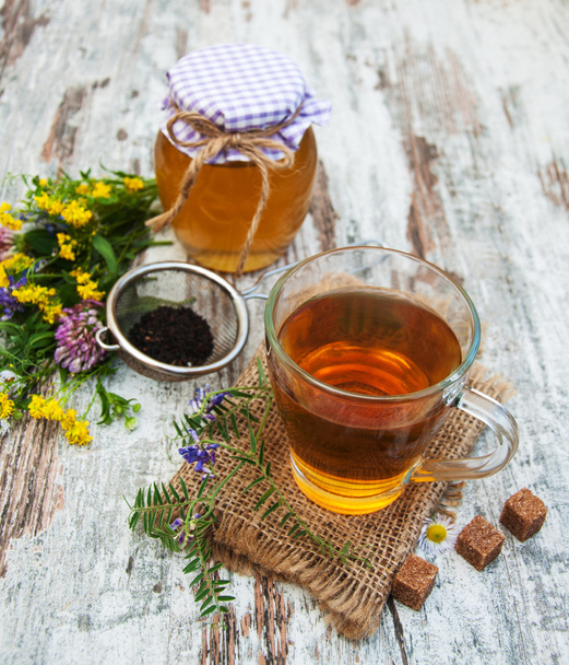 Cup of tea, honey and flowers - Фото, зображення