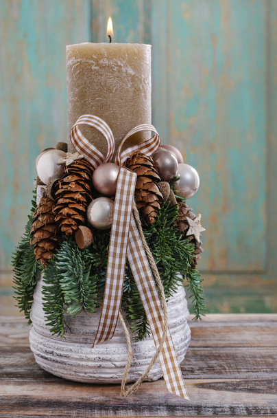 Christmas decoration with candle and cones - Foto, Imagen
