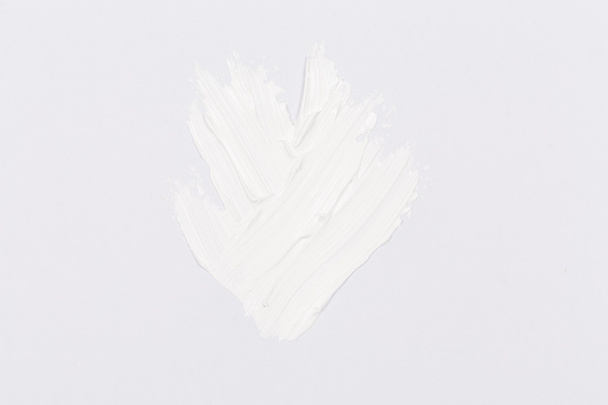 Paint brush stroke over the white paper  - Fotoğraf, Görsel