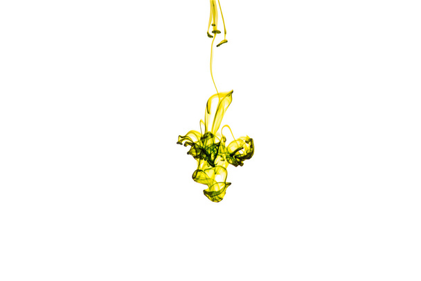 Yellow ink in water on a white background - Photo, Image