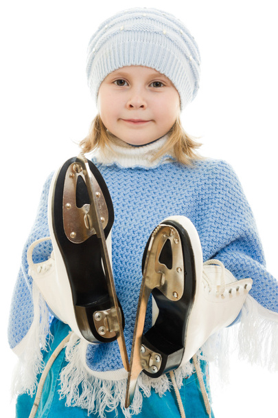 A girl with skates on white background. - Фото, изображение