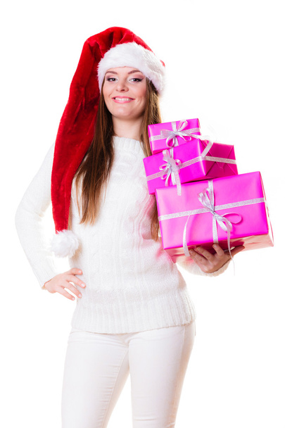 Woman santa helper hat with many pink gift boxes - 写真・画像